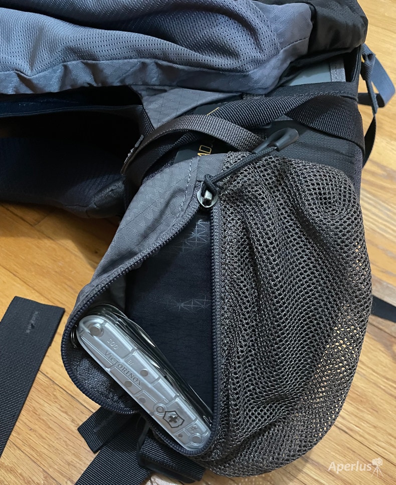 hip belt pockets on a backpacking backpack with a Swiss Army knife