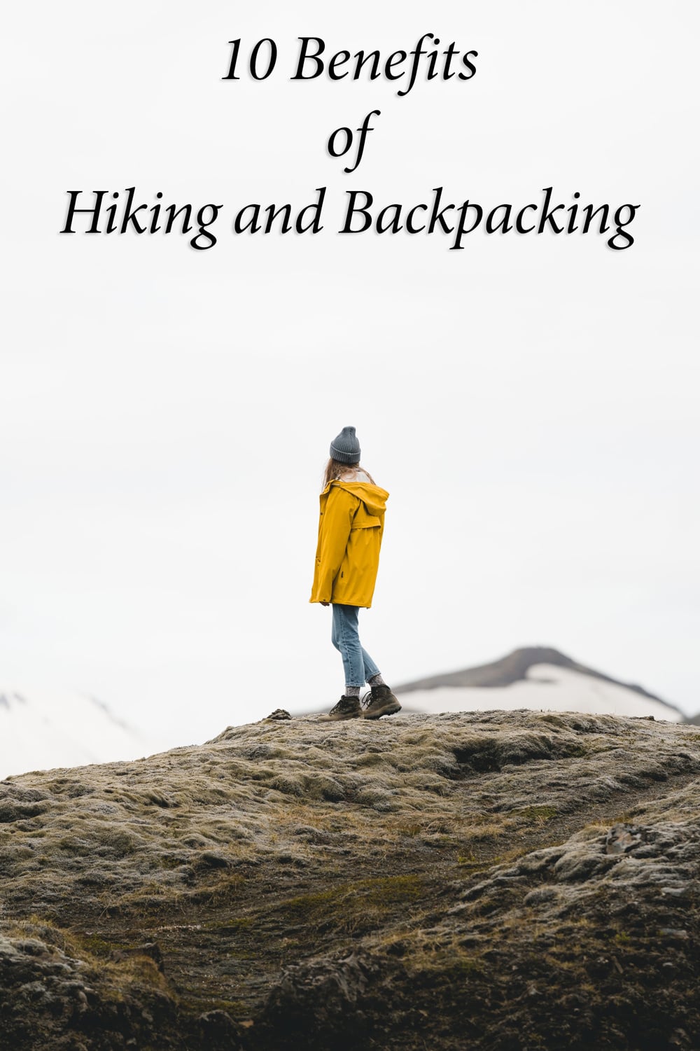 10 benefits of hiking and backpacking  Pinterest pin with female hiker on mountain wearing yellow jacket