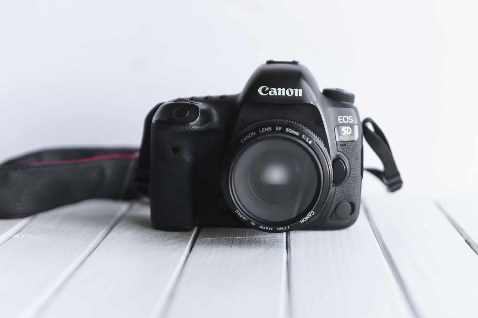 Canon EOS 5D on white table
