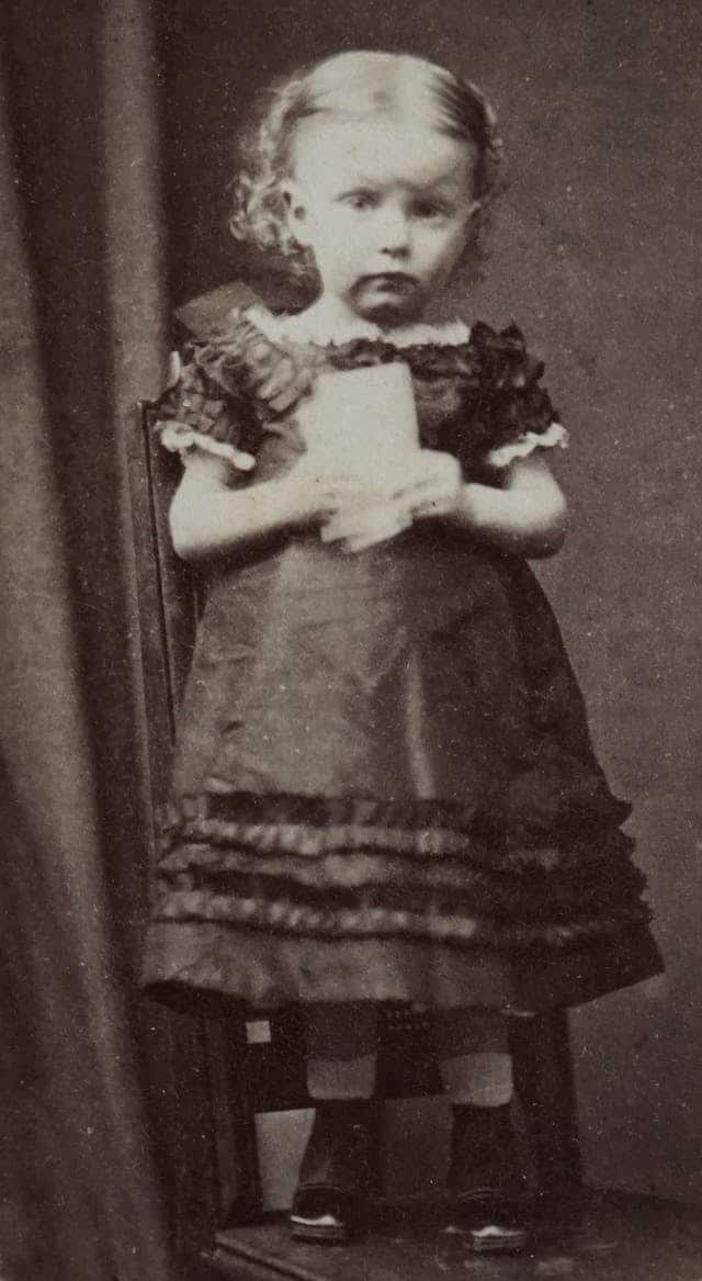 old black and white film photo of little girl